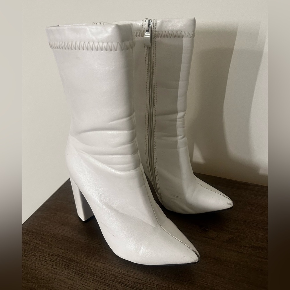 Short pointed white boots